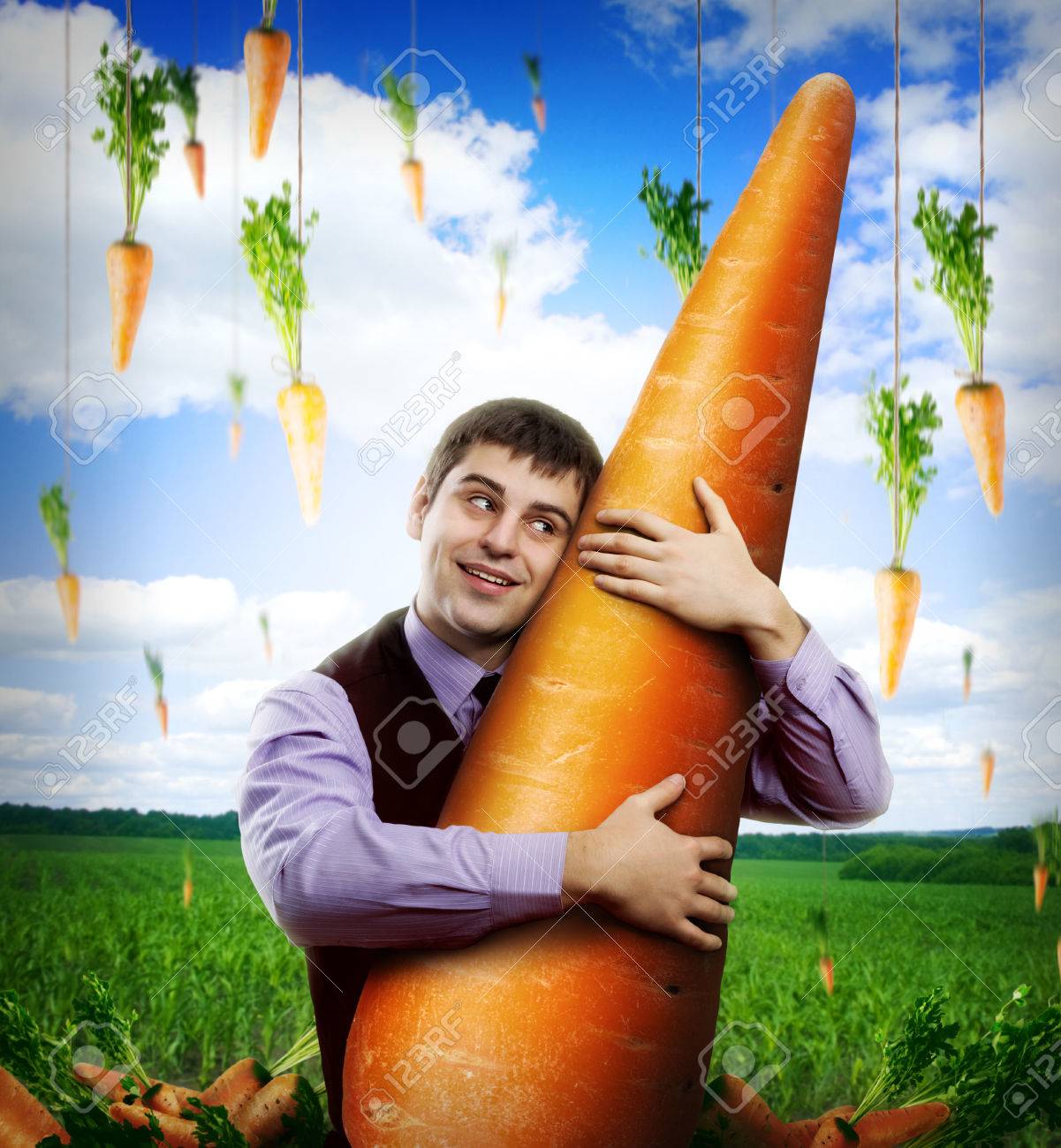 25932804-huge-carrot-and-businessman-under-blue-sky.jpg