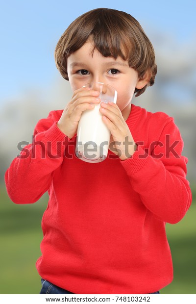 child-drinking-milk-kid-glass-600w-748103242.jpg